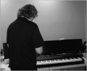 Ron setting up the piano