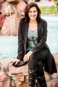 Marcy Requist in front of fountain