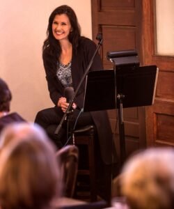 Marcy listening and smiling